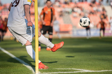 Wall Mural -  Player takes the corner during professional football match.