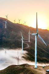 wind power generator before sunrise sunset