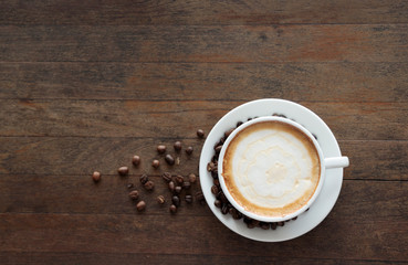 Top view Coffee cup and coffee beans on table