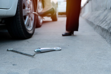 Wall Mural - Women who are encountering broken cars.