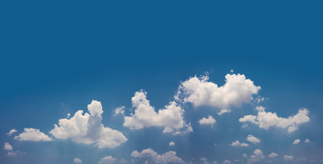 Wall Mural - panorama blue sky with tiny clouds. white soft cloud texture on blue sky background for web