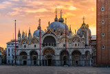 Fototapeta Paryż - Fantastic sunset on San Marco square with Campanile and Saint Mark's Basilica. Colorful evening cityscape of Venice, Italy, Europe. Traveling concept background. Artistic style post processed photo.