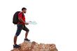 © kinwun - Adventurer man standing on rocky mountain with backpack and map isolated on white background with clipping path