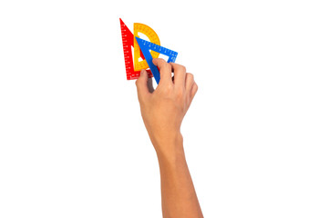 Wall Mural - Plastic set square for geometric mathematics in mathematics class holding by asian boy hand isolated on white background. Asian boy hand holding mathematics set square.