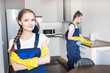 © xartproduction - Cleaning service with professional equipment during work. professional kitchenette cleaning, sofa dry cleaning, window and floor washing. man and women in uniform, overalls and rubber gloves