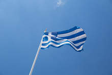 Greek Flag Waving On Blue Sky Clouds Greece