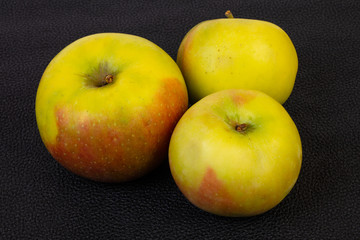 Ripe apples over background