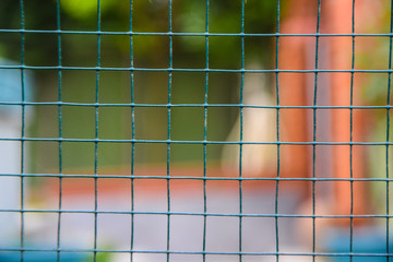 wire garden fence,green background