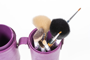 Bunch of make-up brushes - Cosmetics and beauty. Make-up brushes set in row on white  background