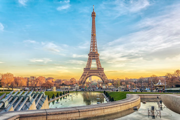 eiffel tower at sunset in paris, france. romantic travel background