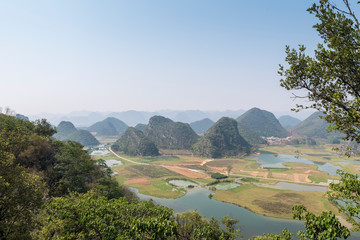 Wall Mural - Natural scenery of karst landforms in Yunnan Province, China