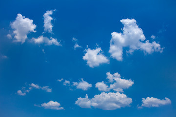 Wall Mural - blue sky white clouds. blue background. relaxing and feeling in the sky.