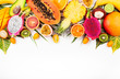 canvas print picture - Still life with fresh assorted exotic fruits on a palm leaf.