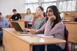 © Nejron Photo - Multinational group of students in an auditorium