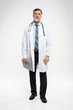 © opolja - Full body portrait of happy smiling doctor, isolated on white background.