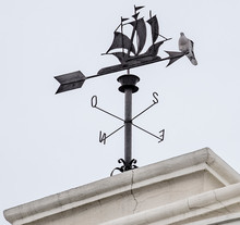 Sailing Ship Weathervane With A Pigeon On Top