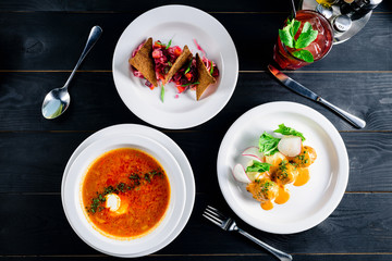 Poster - Enjoy your meal. Set of three delicious dishes served on a restaurant table