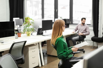 Wall Mural - Young people working in modern office