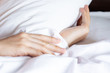 © DG PhotoStock - Woman sleeping, close up shot on woman's hands while she's sleeping.