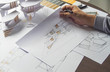 © Chaosamran_Studio - architect design working drawing sketch plans blueprints and making architectural construction model in architect studio