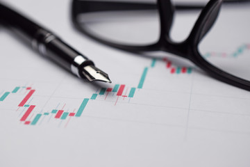 Poster - expensive pen forex on charts, closeup