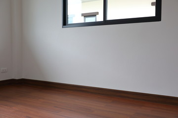 Wall Mural - interior design empty white room with glass window and wooden laminate floor of a new residential house