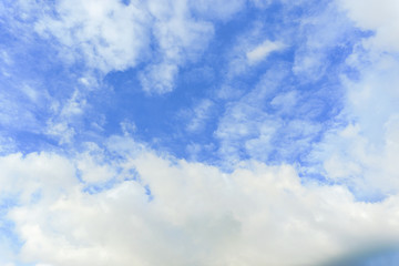 Beautiful white fluffy clouds with blue sky background. Nature weather, the vast cloud blue sky.