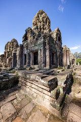 Beautiful face sculptures at the famous Bayon temple in the Angkor Thom temple complex, Siem Reap, Cambodia