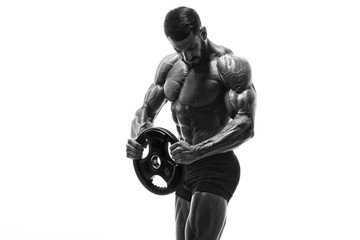 Handsome Muscular Men, Bodybuilder Lifting Weights. Black and White Image