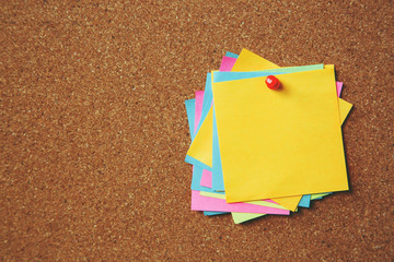 Wall Mural - collection of colorful variety. paper note pad reminder sticky notes pin paper yellow on cork bulletin board. empty space for text.