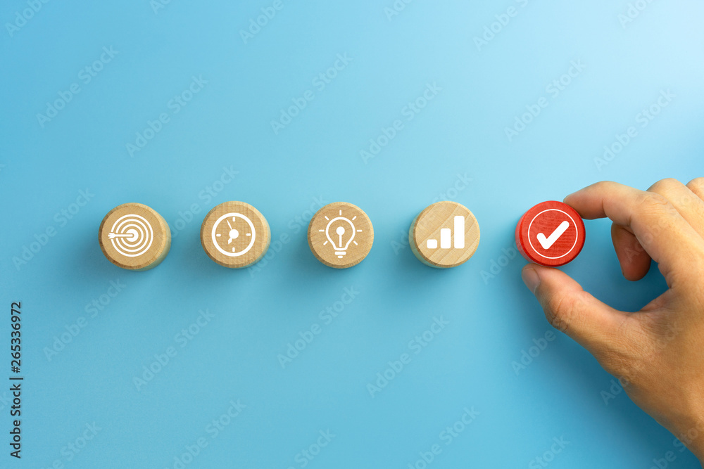 Business process management, Businessman plan a project with wooden cubes with icon business strategy on blue background. copy space - obrazy, fototapety, plakaty 