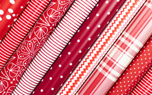 Red And White Gift Wrapping Paper Rolls In Variable Colors