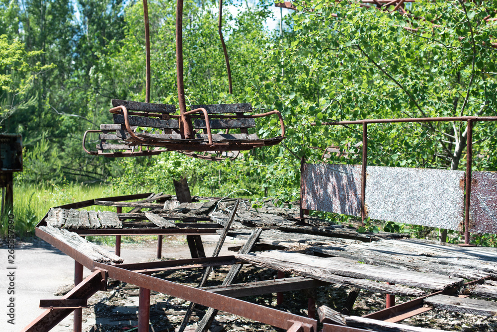 Abandoned carousel and abandoned ferris at an amusement park in the ...