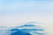 Aerial landscape mountains lost in thick fog in China, bird eye view landscape look like a chinese style of painting