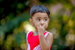 © Niks Ads - cute indian baby girl  playing in the park