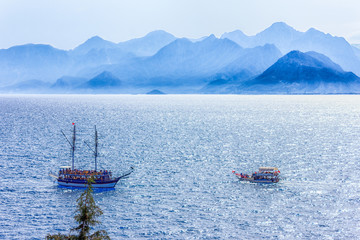 Wall Mural - Mediterranean landscape in Antalya. View of the mountains, sea, yachts and the city