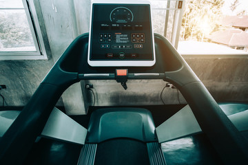 Close up digital display screen control exercise  treadmill  equipment interior gym and modern fitness room center