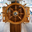 © Designpics - Wooden steering wheel on a boat; Kotor, Montenegro