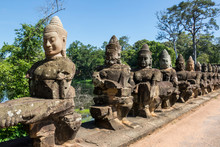 Stone Figures On The Causeway To The South Gate Tower (Gopuram); Angkor Thom, Siem Reap, Cambodia