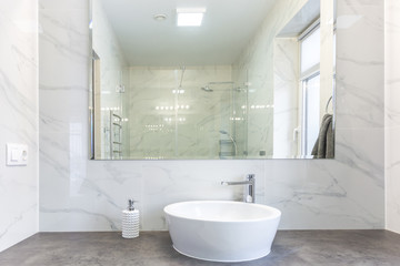 Sticker - Soap and shampoo dispensers near Ceramic Water tap sink with faucet in expensive loft bathroom