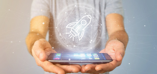 Poster - businessman holding a start up rocket on a sphere 3d rendering