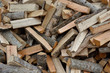 Chopped firewood not folded close up. Background