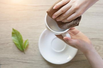 Coffee espresso on wood table nature background in garden,warm tone