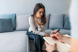 Psychologist listening to woman in trouble during therapy session. Psychotherapist understanding problems of a woman patient. Cropped image of depressed man at the psychotherapist.