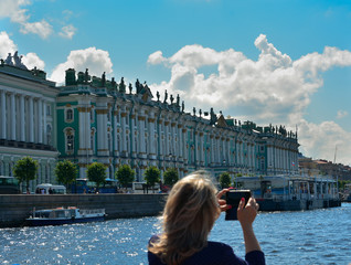 Wall Mural - Russia, St. Petersburg Summer unknown woman taking a picture