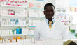 © JackF - African American pharmacist in drugstore