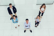 © Mediteraneo - Young  business people group walking standing and top view