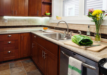 Sink, Dishwasher And Cabinets In Kitchen