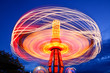 © Mint Images - Spinning chain swing ride at Puyallup Fair, Puyallup, Washington, United States