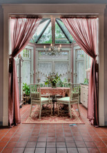 Curtains And Dining Table In Ornate Dining Room